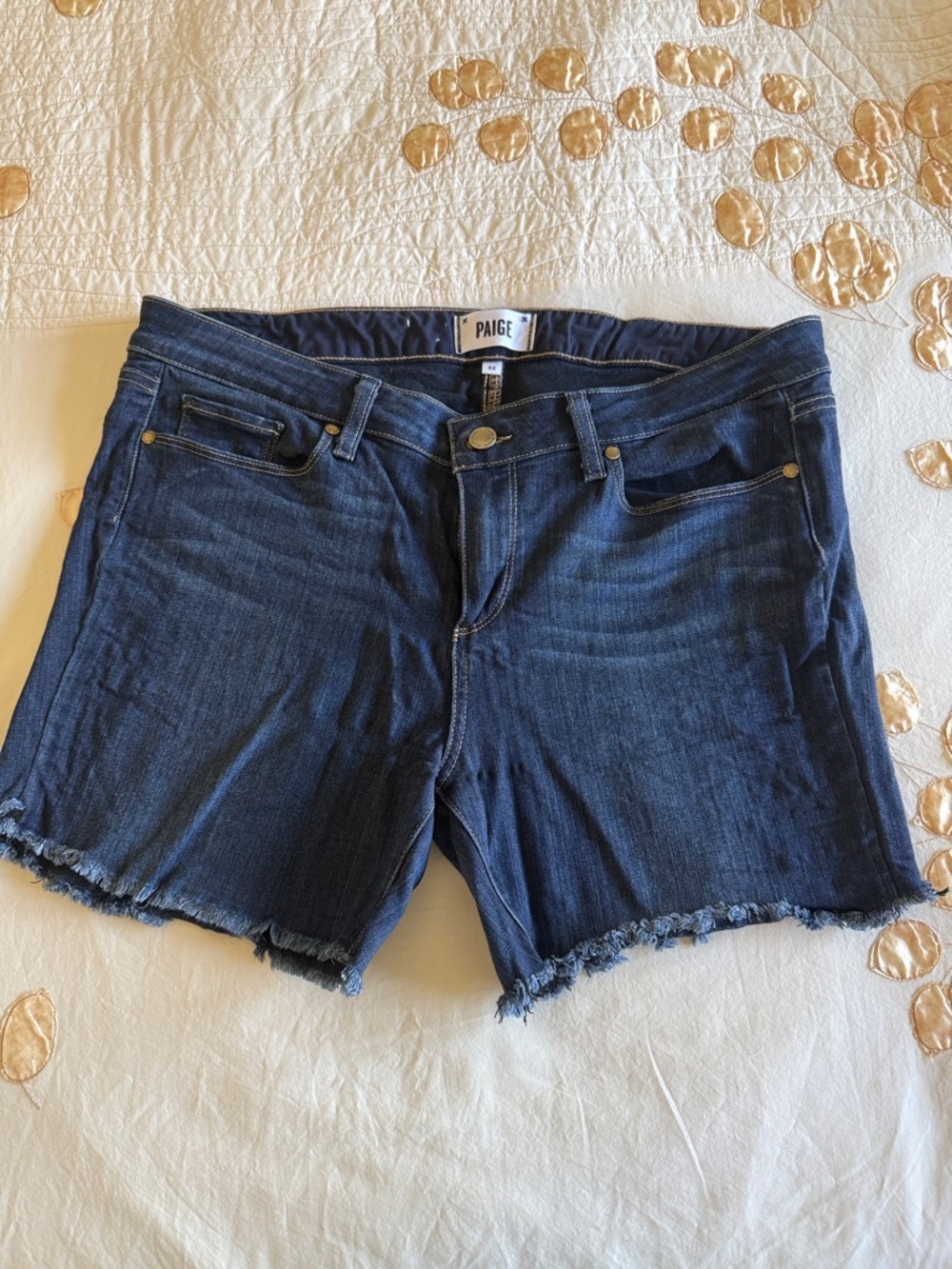 PAIGE Indigo Frayed Hem Denim Shorts